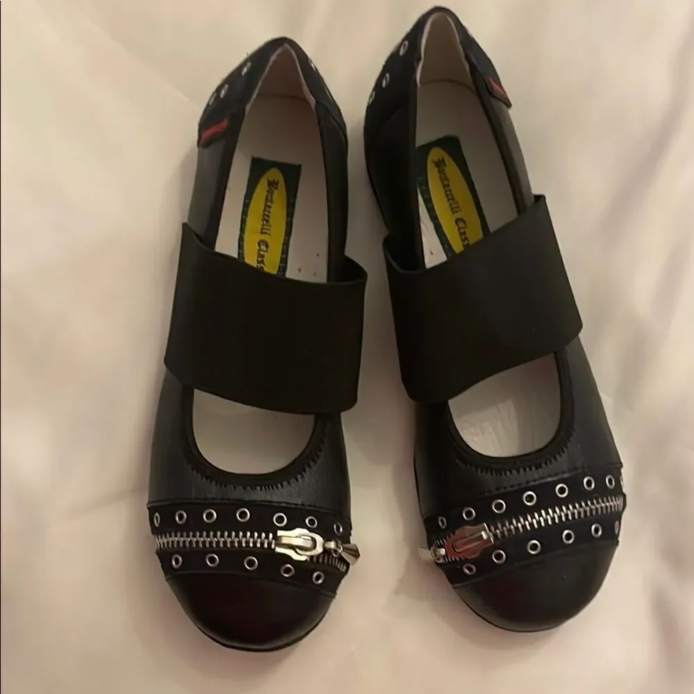 BOUTACCELLI CLASSICS black zippered front, stud design w/studs also on back heel